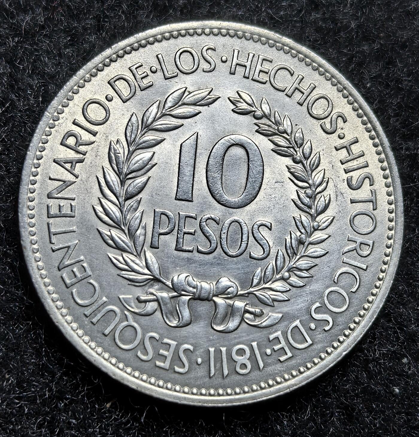 西班牙、丹属西印度、法属殖民地、乌拉圭银币古铜币，周五晚上九点倒数截拍，满百包邮，可寄存半年，喜欢朋友微信扫描二维码可直接参拍 全新乌拉圭1961年10比索银币，km43