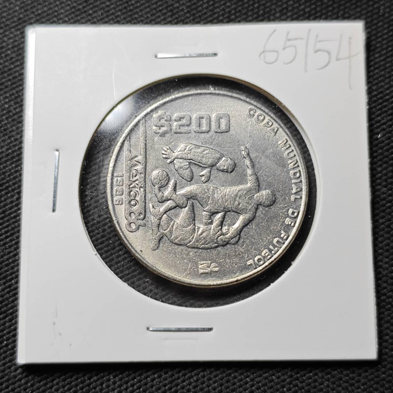 KK钱币收藏小铺  第365场  2月预留时间 周末发货  1986墨西哥200比索纪念币 世界杯纪念币