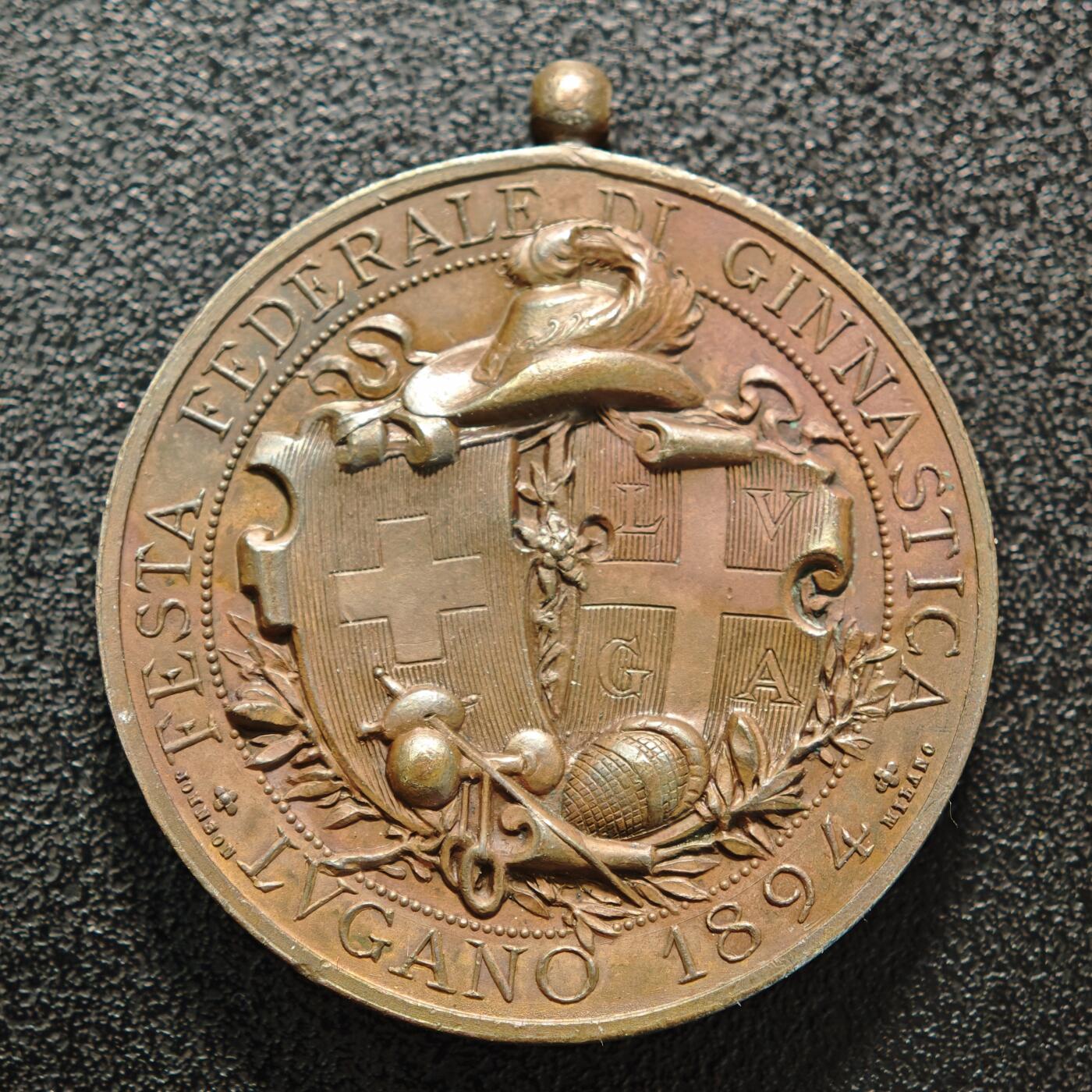 【德藏】世界币章拍卖第152期（拍品征集中~欢迎藏友联系） 1894年 瑞士卢加诺联邦体操节高浮雕纪念铜章 设计细腻 浮雕感极强 直径约：35.2mm；重约：23.4g
