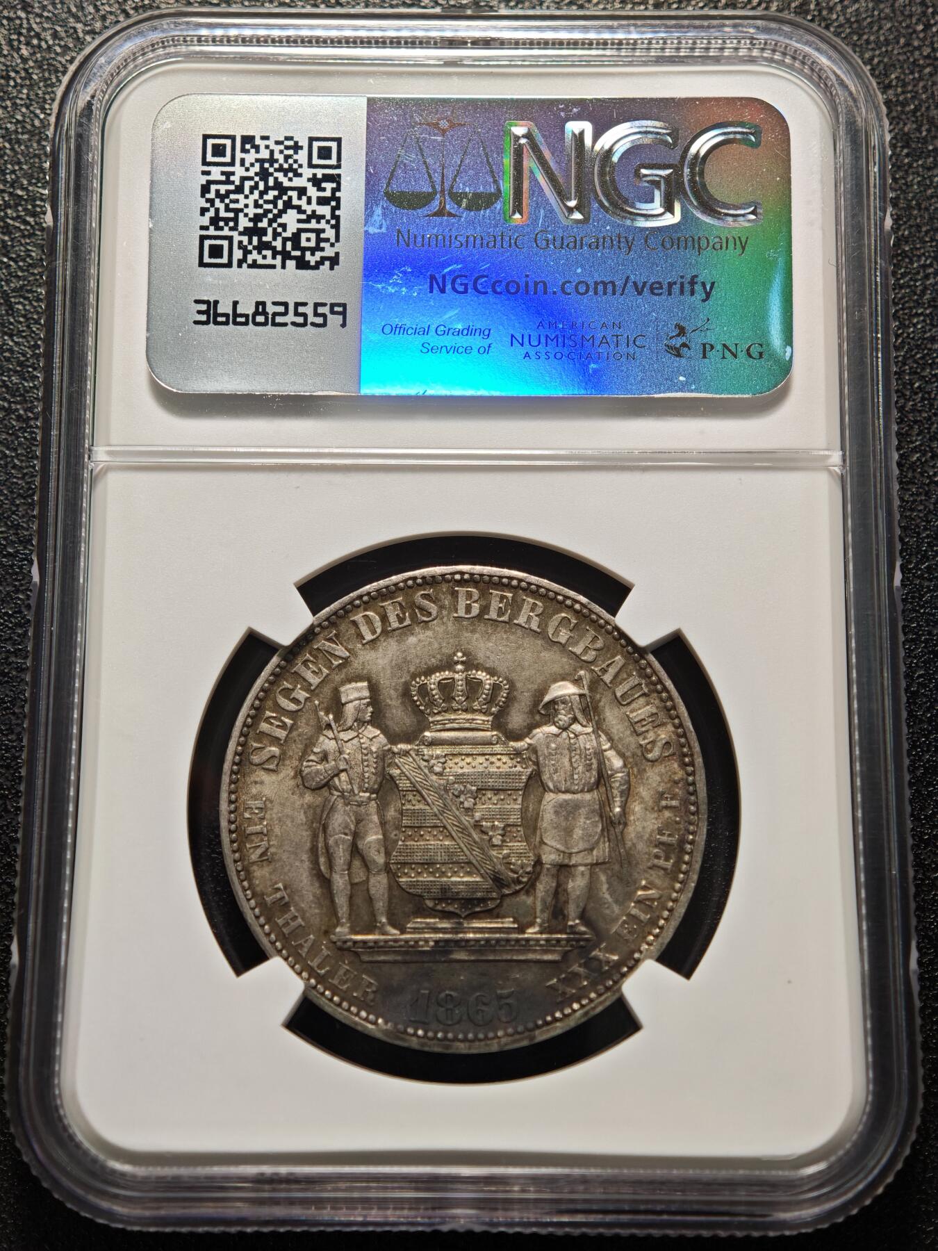【德藏】世界币章拍卖第152期（拍品征集中~欢迎藏友联系） 1865年 德国萨克森王国矿业1泰勒银币  酱彩环状包浆状态好 正面是国王头像背面是两个矿工守护王国盾徽 NGC UNC