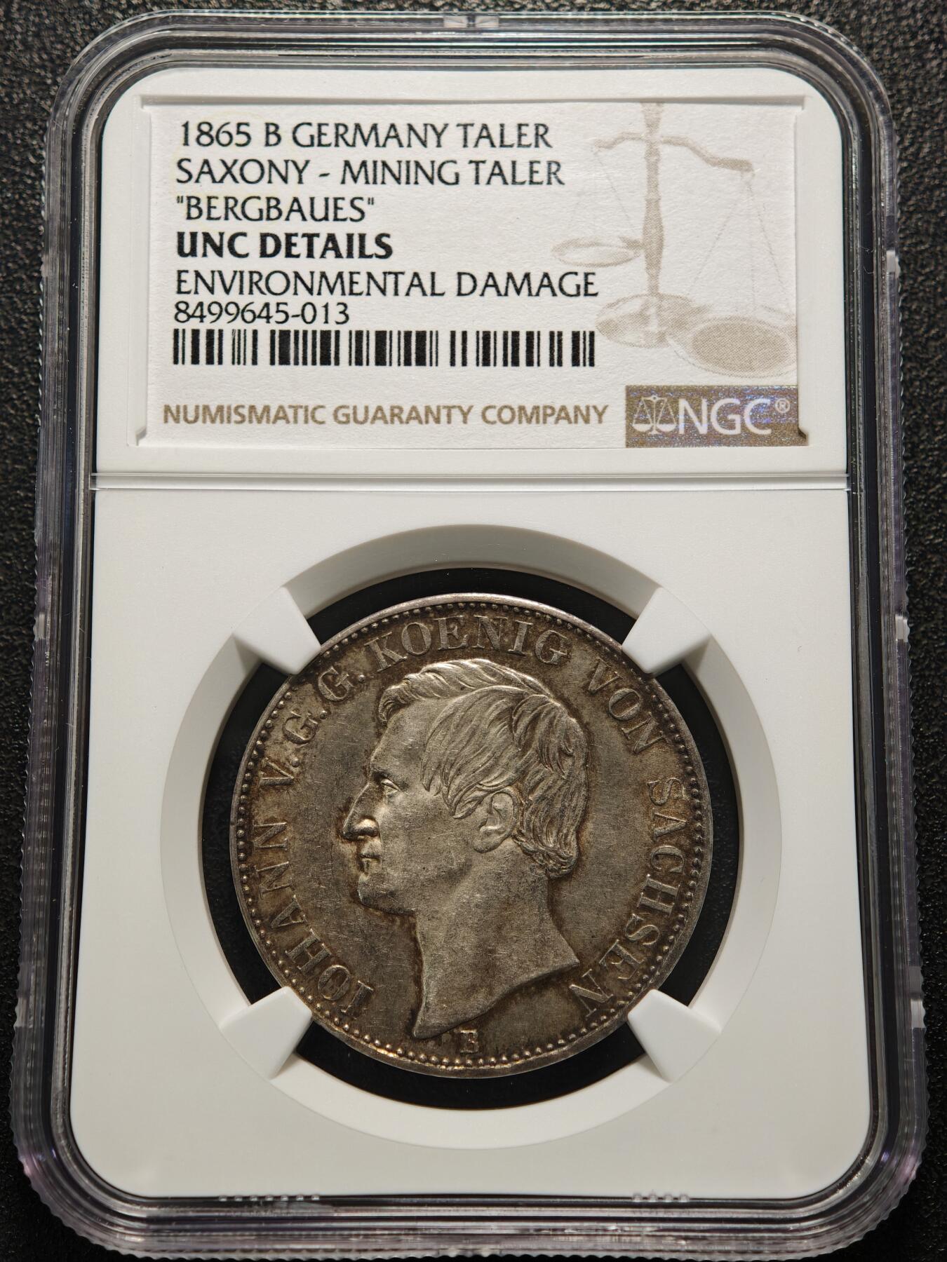【德藏】世界币章拍卖第152期（拍品征集中~欢迎藏友联系） 1865年 德国萨克森王国矿业1泰勒银币  酱彩环状包浆状态好 正面是国王头像背面是两个矿工守护王国盾徽 NGC UNC