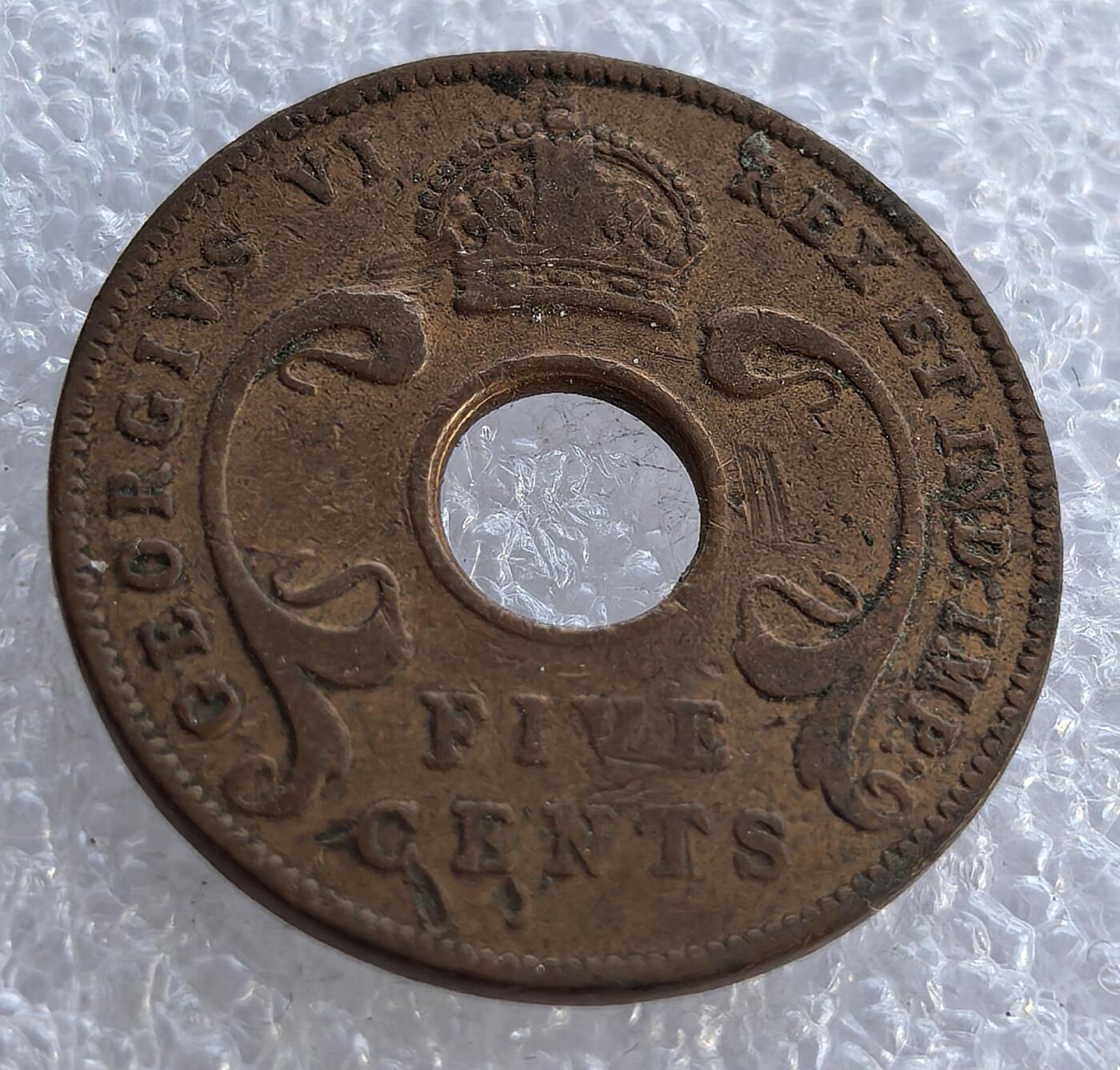  外国优质老铜币银币，周六九点倒数截拍，满百包邮，可寄存半年，喜欢朋友微信扫描二维码可直接参拍 东非1942年5分