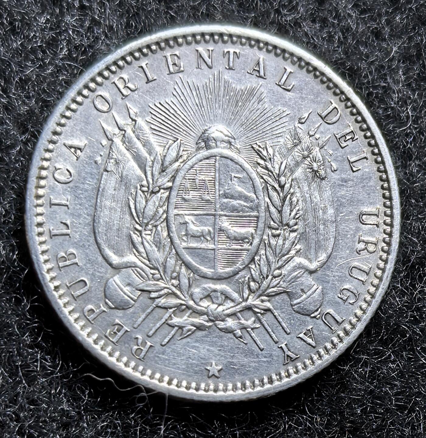 西班牙、丹属西印度、法属殖民地、乌拉圭银币古铜币，周五晚上九点倒数截拍，满百包邮，可寄存半年，喜欢朋友微信扫描二维码可直接参拍 AU品相乌拉圭1877年20分银币，km15