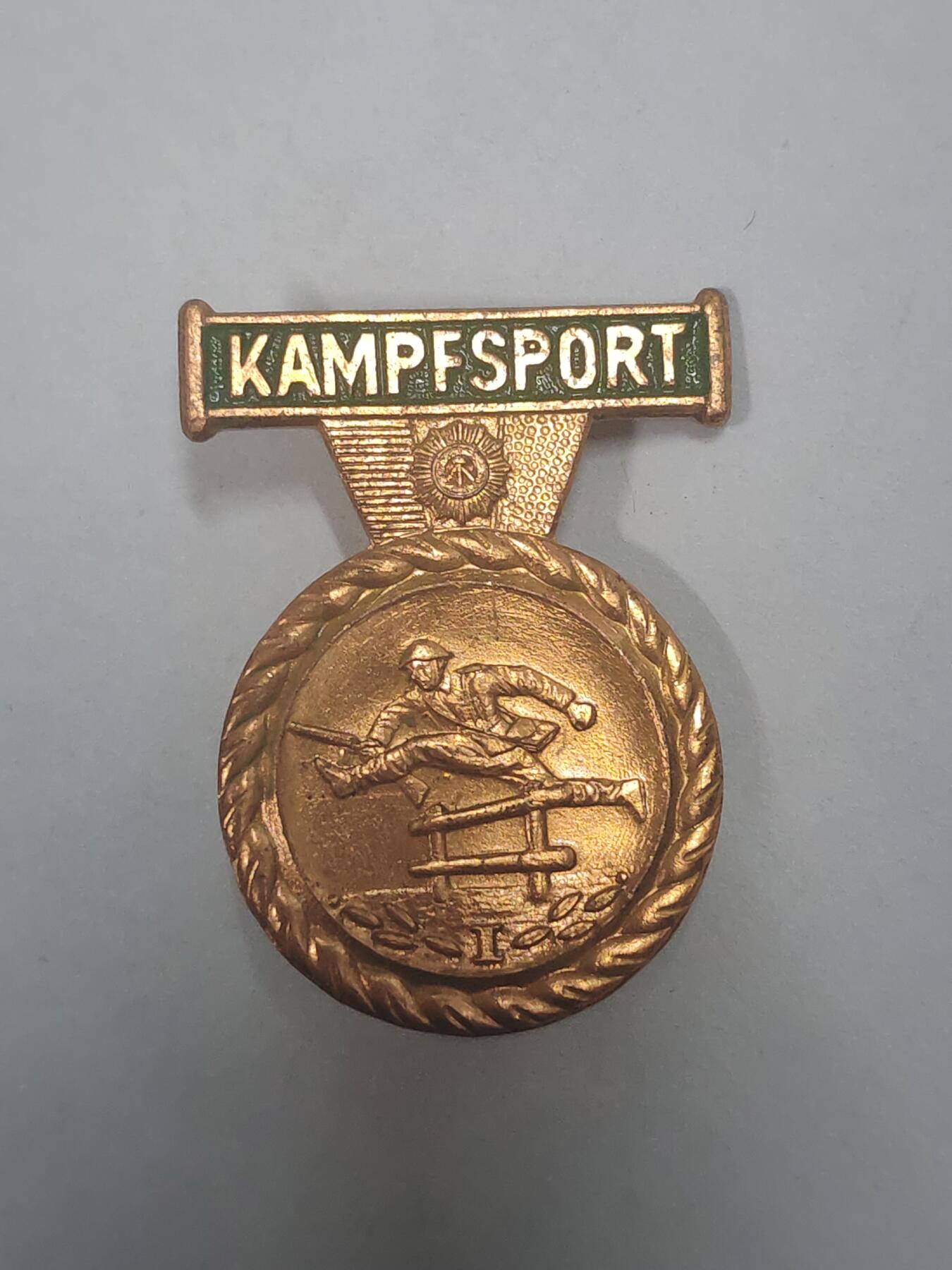 荷兰第128期勋赏拍卖 民主德国内务部铜级体能证章