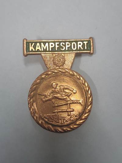 荷兰第128期勋赏拍卖 - 民主德国内务部铜级体能证章