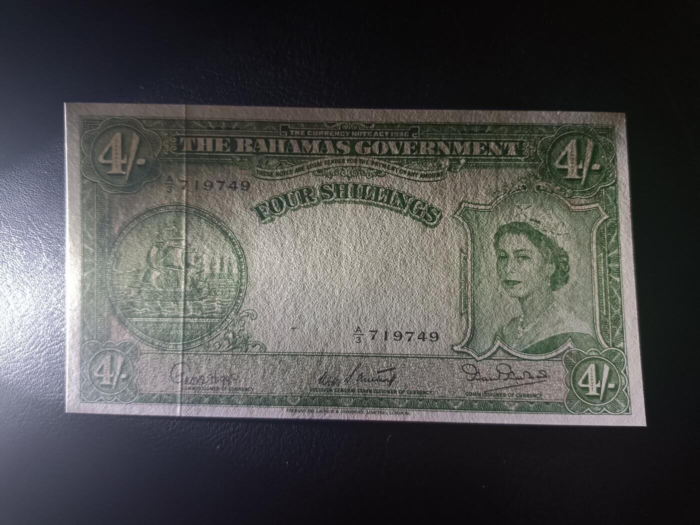 2025十一月第二期，总第200期 英属巴哈马1953版4先令AUNC，大皇冠女王和总督府徽章