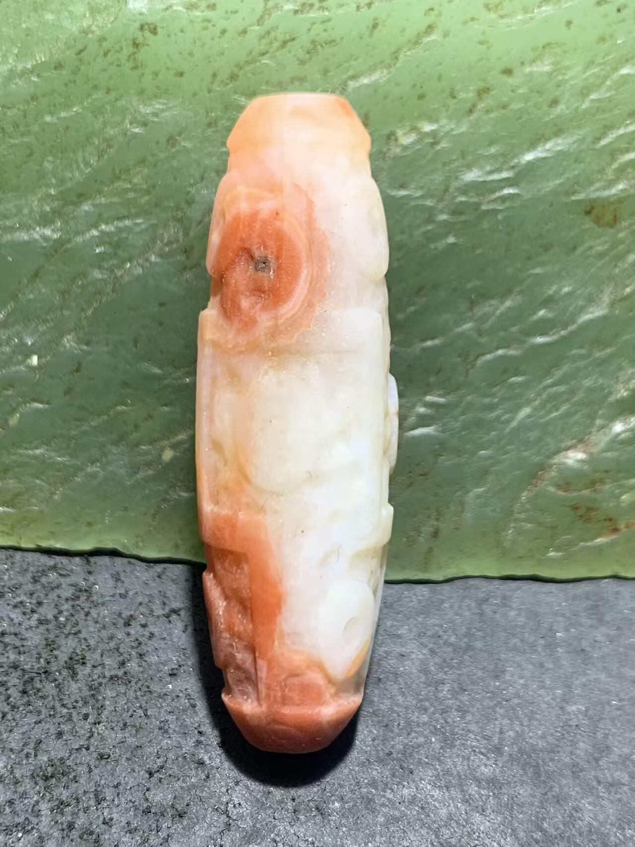 精美川料亚光红白南红玛瑙雕刻九眼天珠一个，