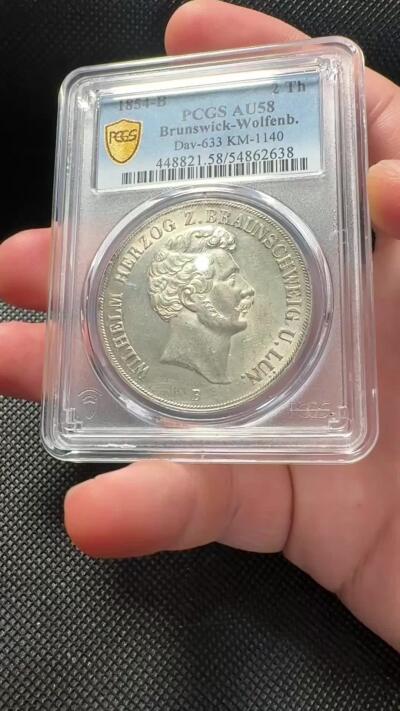 甄臻铺-世界币章拍卖（第38期）立冬小精品场，送拍享返佣金等优惠多多 PCGS-AU58 德国1854年 不伦瑞克狼堡威廉2泰勒大银币 盾徽版 流通主币，250000发行量，非常见年份 状态非常好，疑似低评，十字大转光