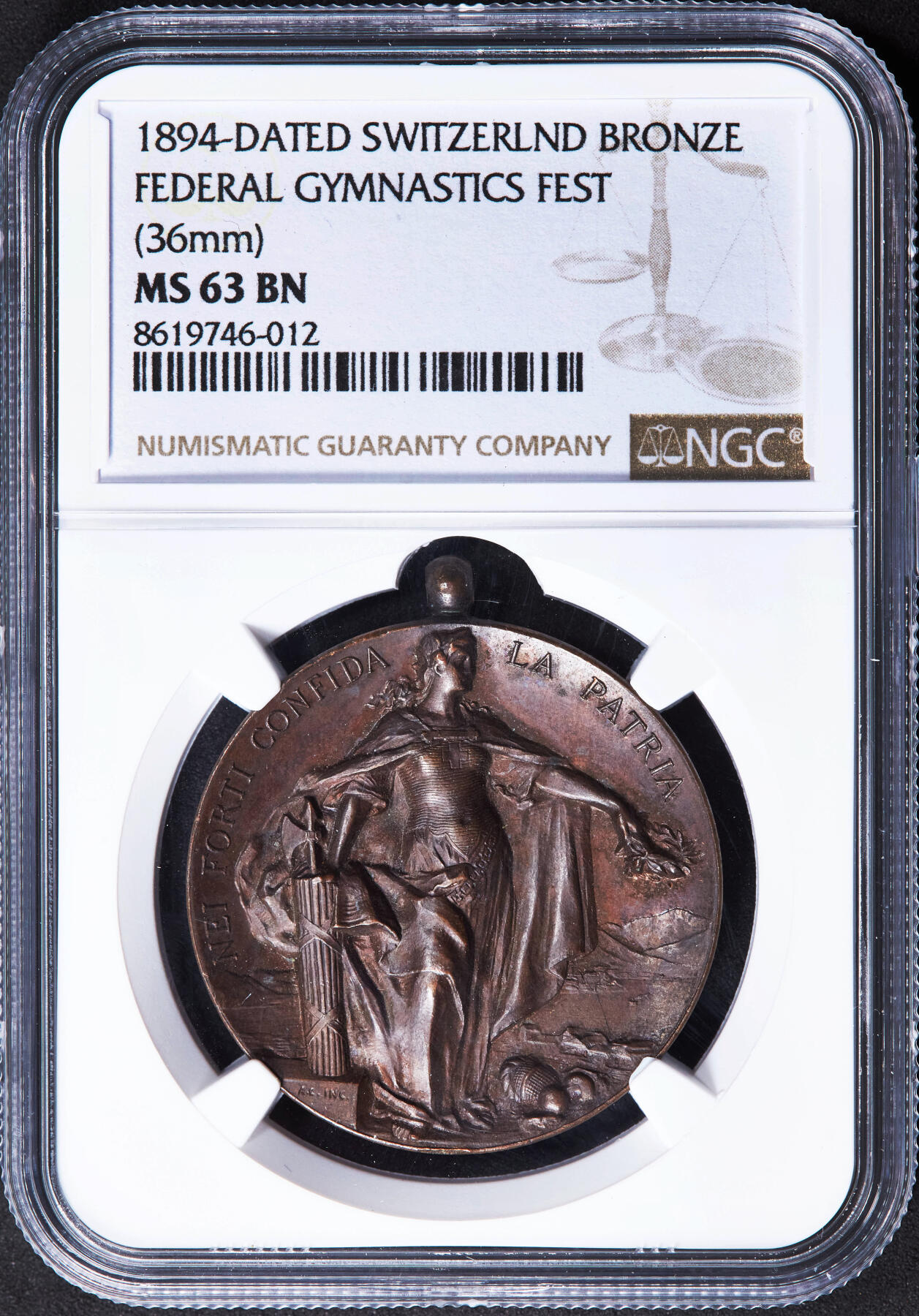 【俄甄集藏】2025年(044)11-12星期三晚 19:30 全场包邮 瑞士1894年纪念卢加诺联邦体操节铜章，NGC MS63，高浮雕，巧克力包浆，正面为象征联邦的瑞士女神