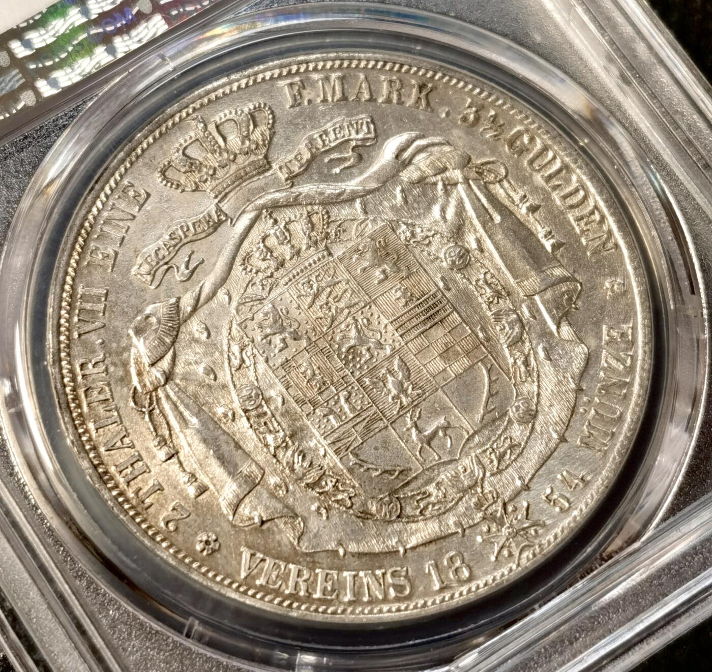 甄臻铺-世界币章拍卖（第38期）立冬小精品场，送拍享返佣金等优惠多多 PCGS-AU58 德国1854年 不伦瑞克狼堡威廉2泰勒大银币 盾徽版 流通主币，250000发行量，非常见年份 状态非常好，疑似低评，十字大转光