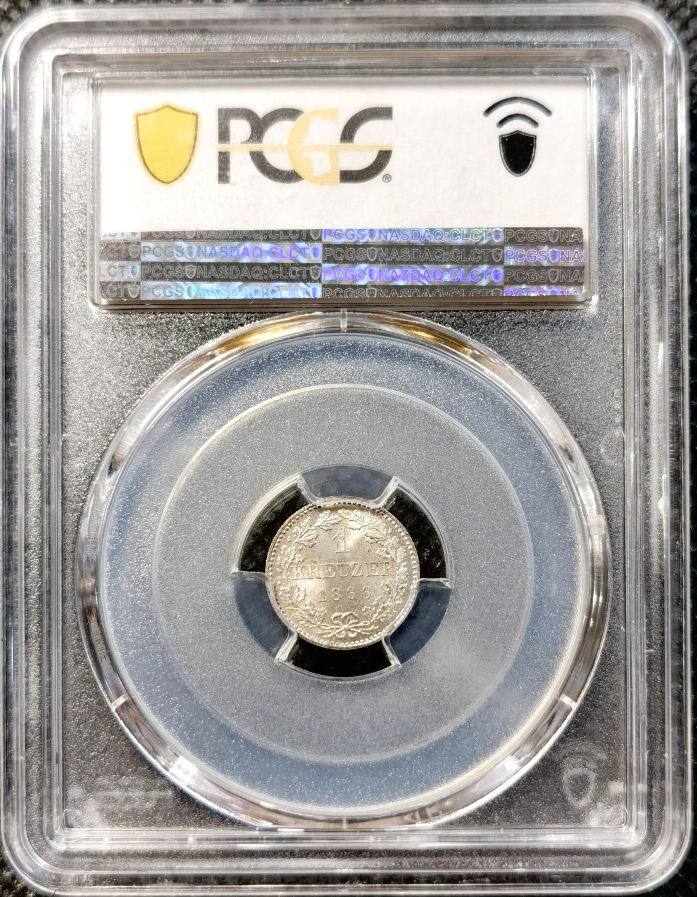 甄臻铺-世界币章拍卖（第38期）立冬小精品场，送拍享返佣金等优惠多多 NGC MS67 1866年德国法兰克福1克鲁泽银币。非常难得的高分，法兰克福经典双鹰徽章，底板如丝绸般细腻有光泽。无瑕疵的一枚精品。