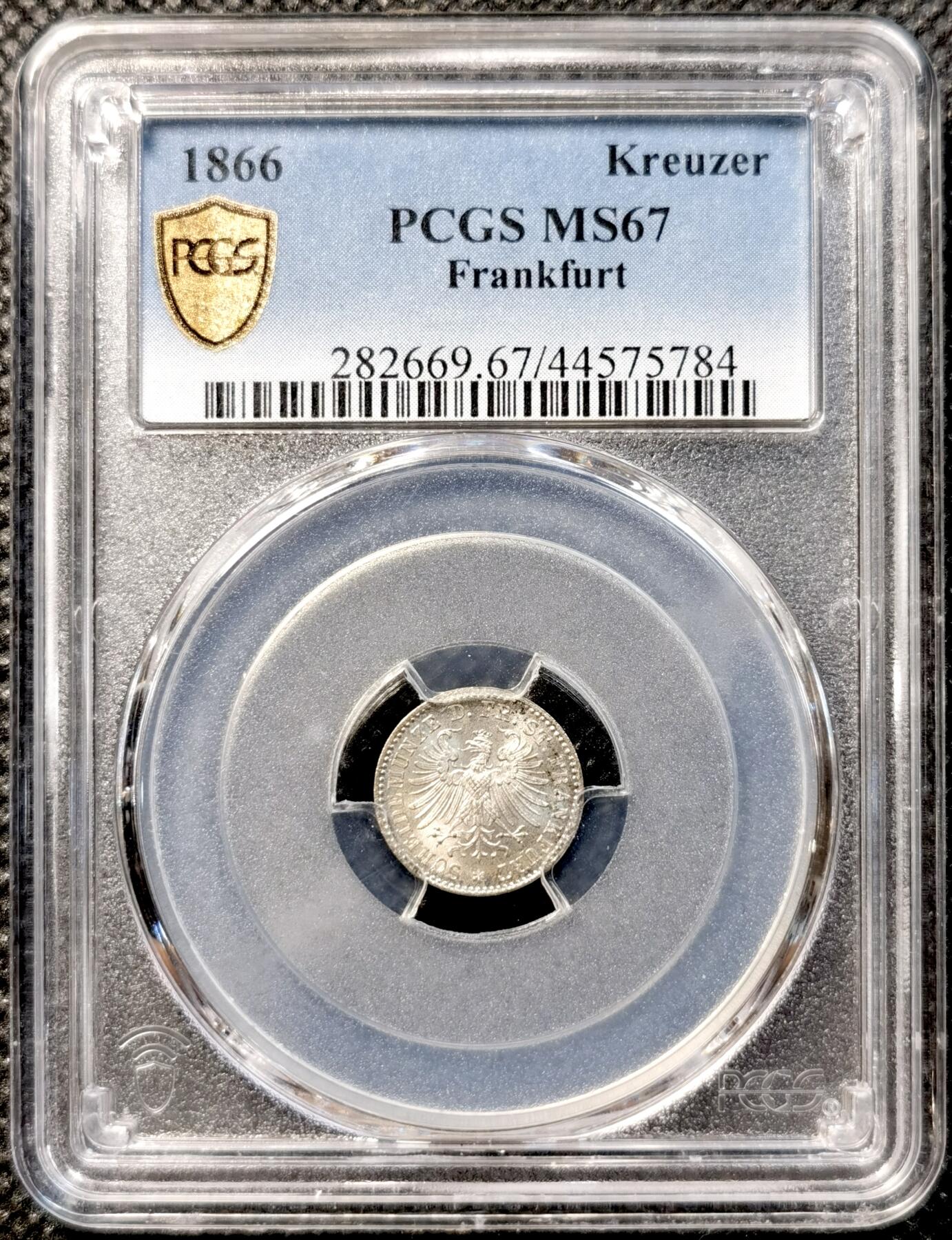 甄臻铺-世界币章拍卖（第38期）立冬小精品场，送拍享返佣金等优惠多多 NGC MS67 1866年德国法兰克福1克鲁泽银币。非常难得的高分，法兰克福经典双鹰徽章，底板如丝绸般细腻有光泽。无瑕疵的一枚精品。