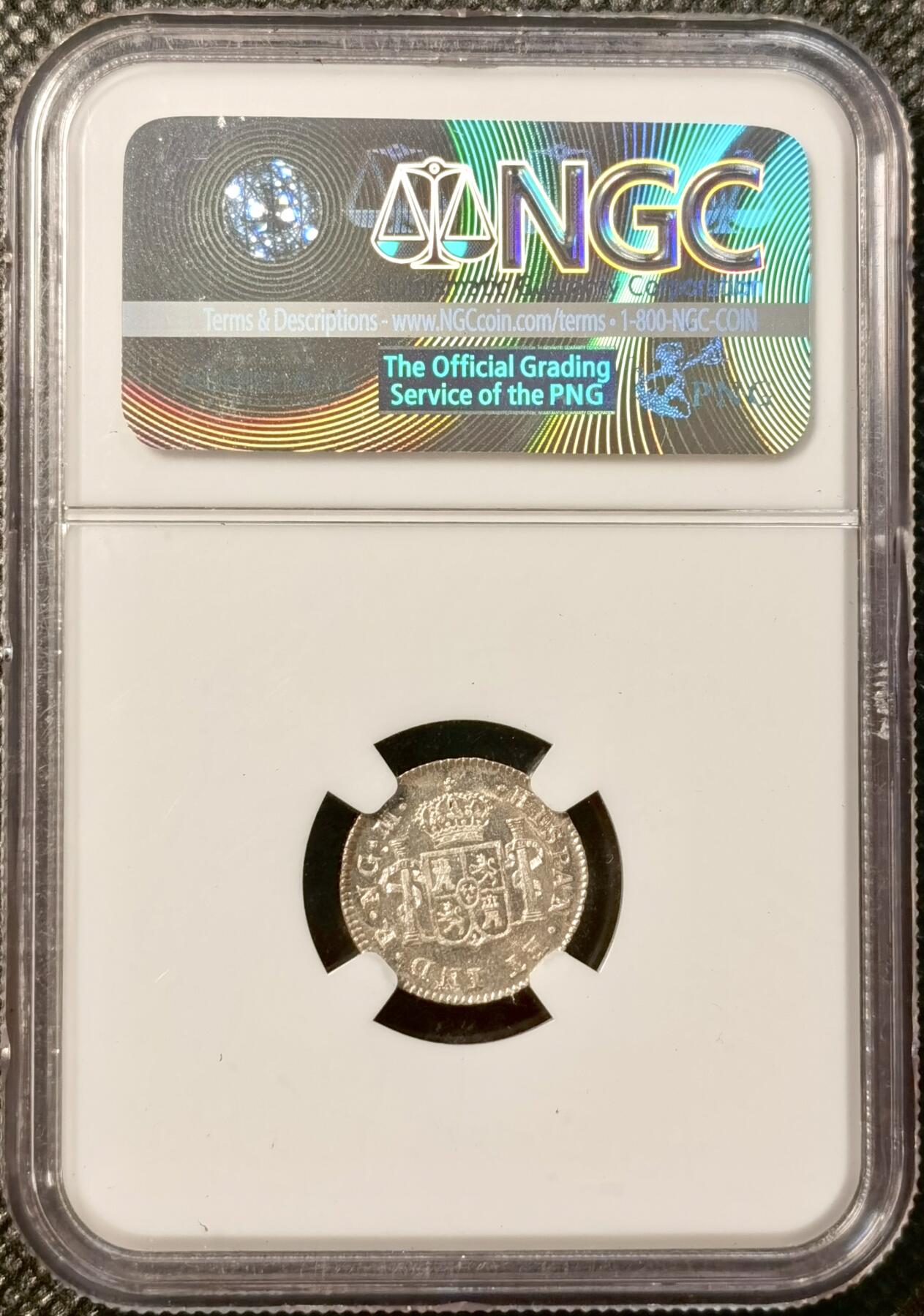 甄臻铺-世界币章拍卖（第38期）立冬小精品场，送拍享返佣金等优惠多多 NGC-MS64 1820年西属危地马拉费迪南七世1/2R小银币 五彩包浆 镜面底板 状态非常好 少见的小面值双柱 足以自藏的一枚 老盒严评 各位藏家把握入手机会 危地马拉比墨西哥 秘鲁 玻利维亚都要少