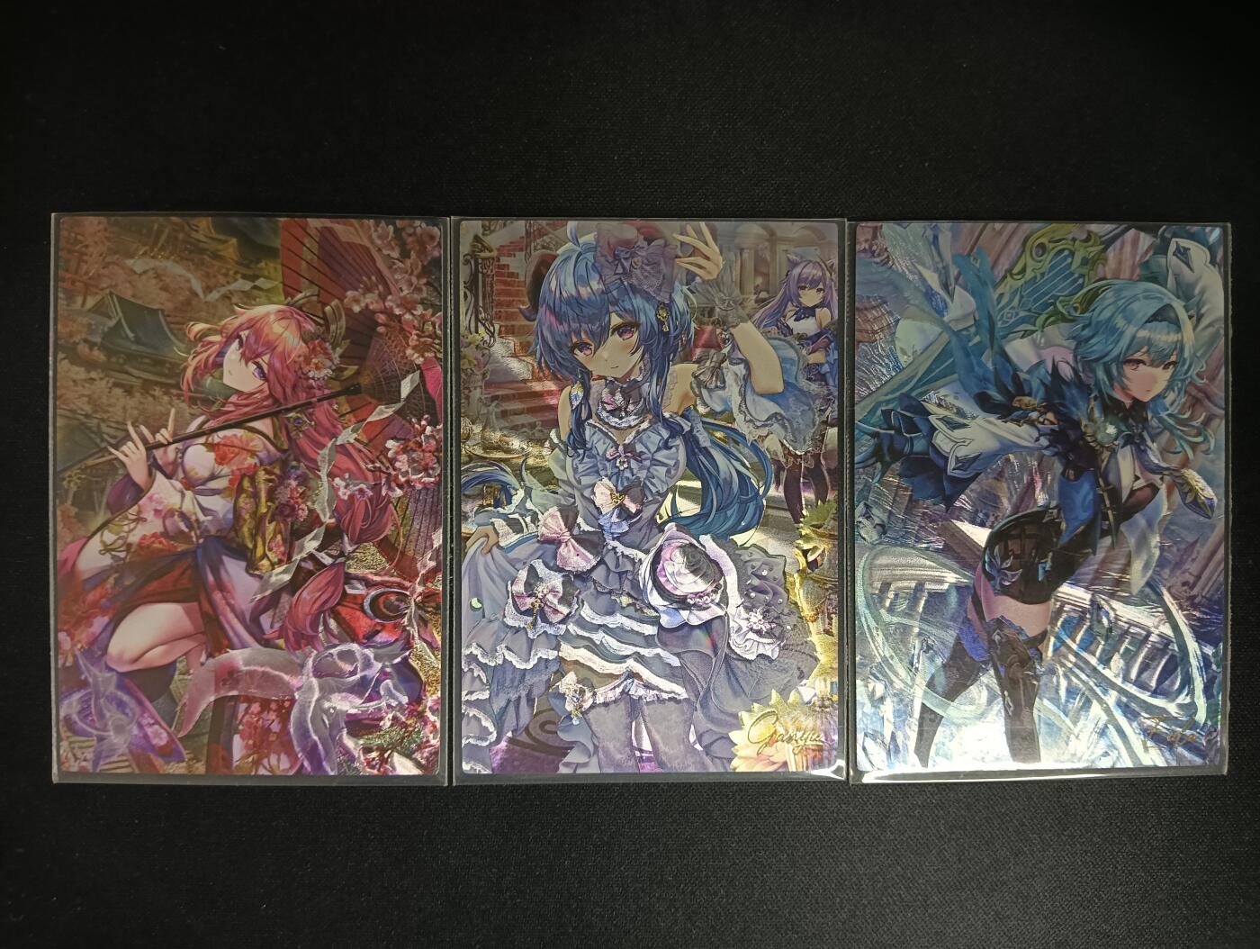 花开卡拍第46期（11月9号周日截拍，品控勿拍!!!拍品不寄存，运费5元，自制卡难免瑕疵，可能存在轻微撞角爆边等出厂瑕疵，品控介意勿拍！） 原神 T画师 1套3张 镭光