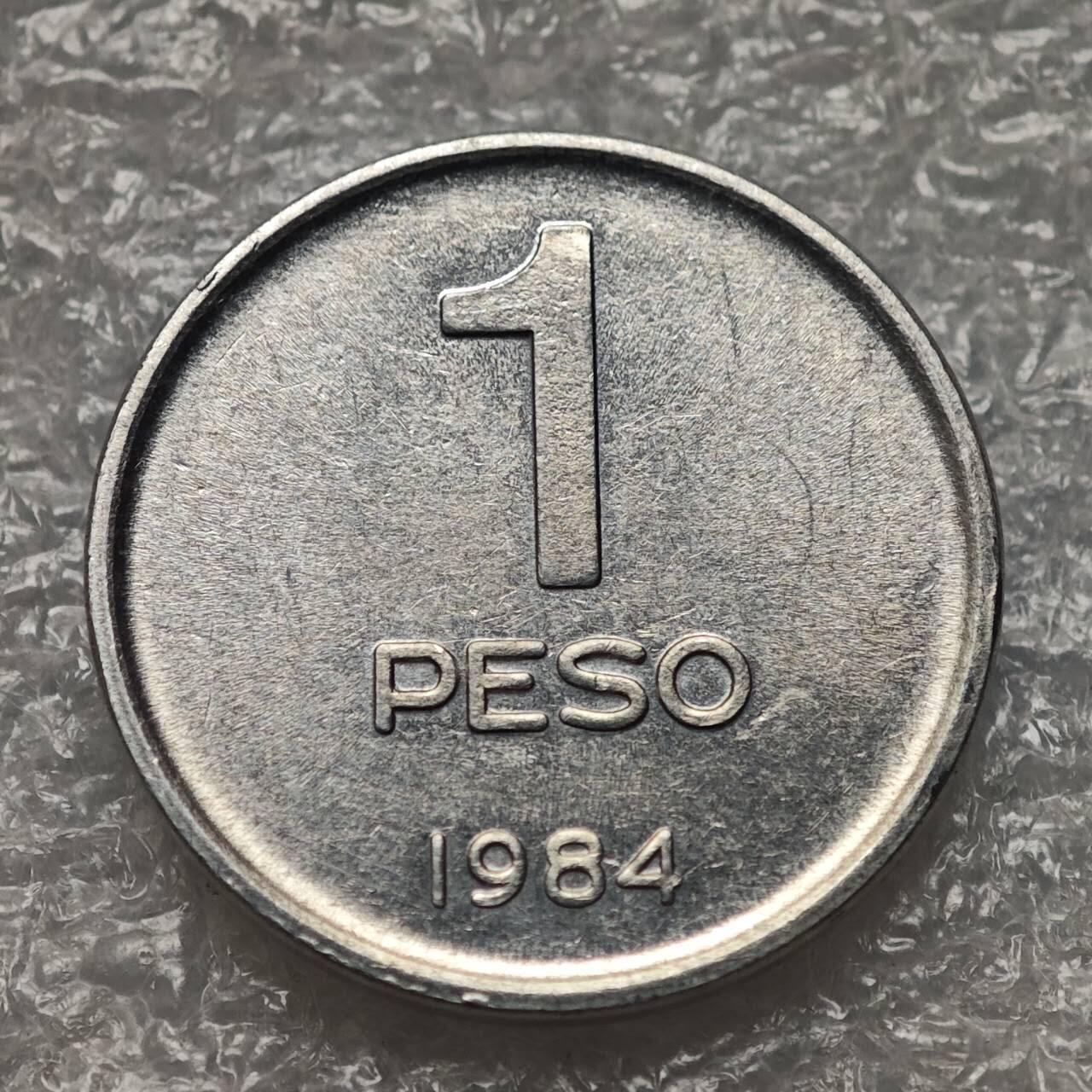 【淘币小摊】限时拍第七百九十五拍  葡属印度爪哇波兰阿根廷专场  满百包邮可预留两周  周一统一发货  阿根廷1984年1比索铝币货币贬值万倍 km91