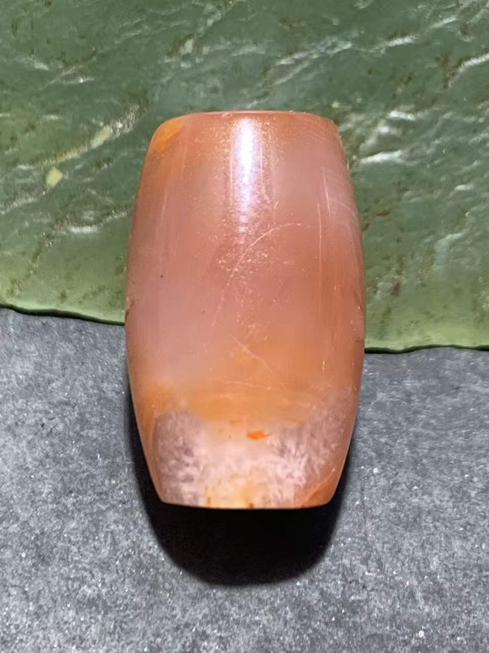 川料冰飘柿子红南红玛瑙随形桶珠一颗！