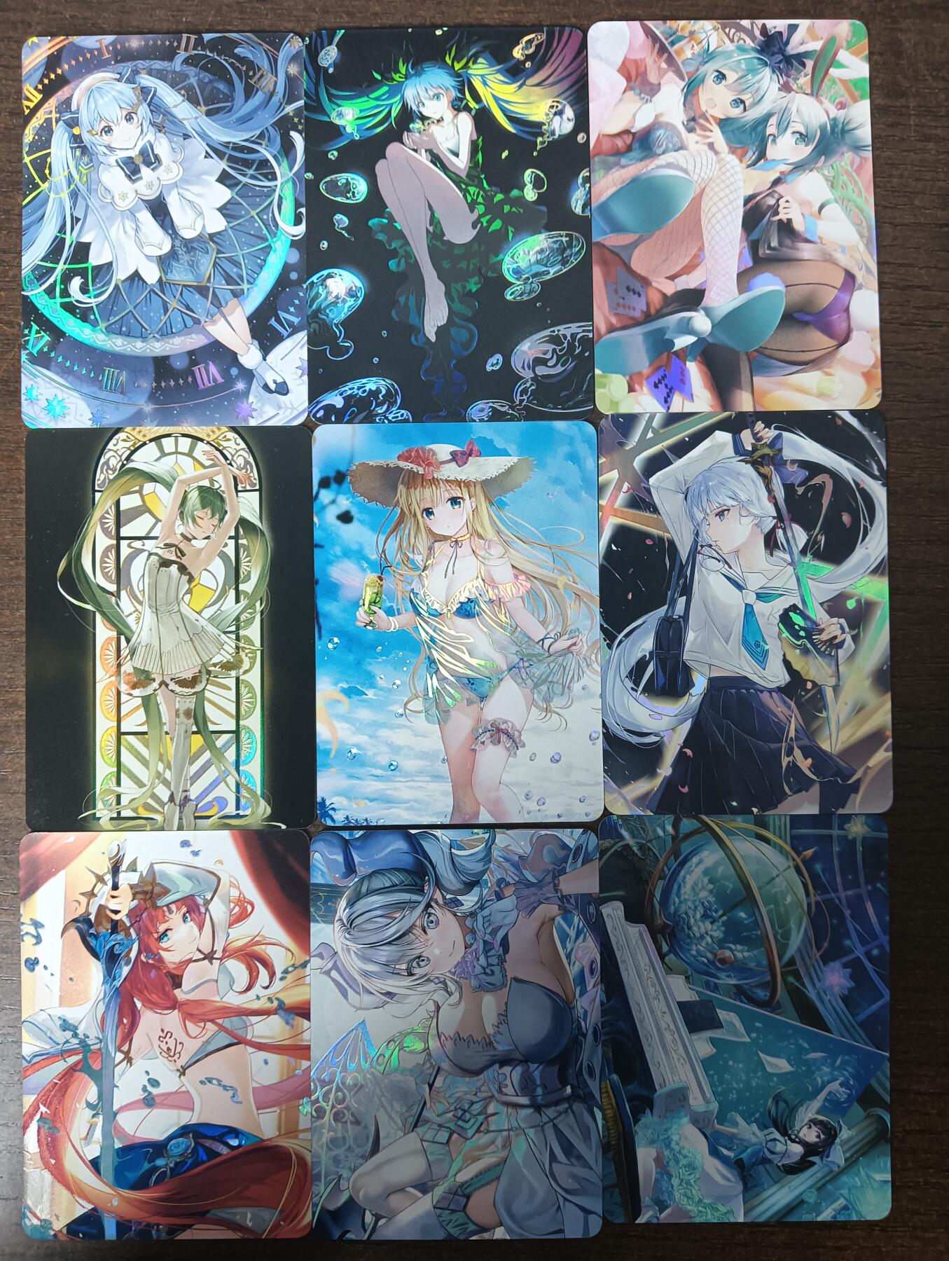 花开卡拍第46期（11月9号周日截拍，品控勿拍!!!拍品不寄存，运费5元，自制卡难免瑕疵，可能存在轻微撞角爆边等出厂瑕疵，品控介意勿拍！） ACG美少女02 1套9张 彩闪