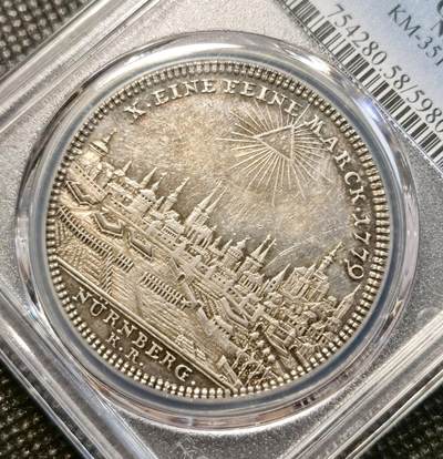 甄臻铺-世界币章拍卖（第38期）立冬小精品场，送拍享返佣金等优惠多多 PCGS-AU58 1779年德国纽伦堡城市景观泰勒大银币 五彩包浆 63分中万的品种 性价比分数 细节几乎没有磨损 更高分仅有8枚