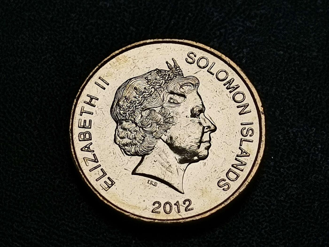 世界各国普、纪币捡漏专场(第十八场) 【绝版】2012年伊丽莎白女王英属所罗门群岛土著神兽雕塑1元