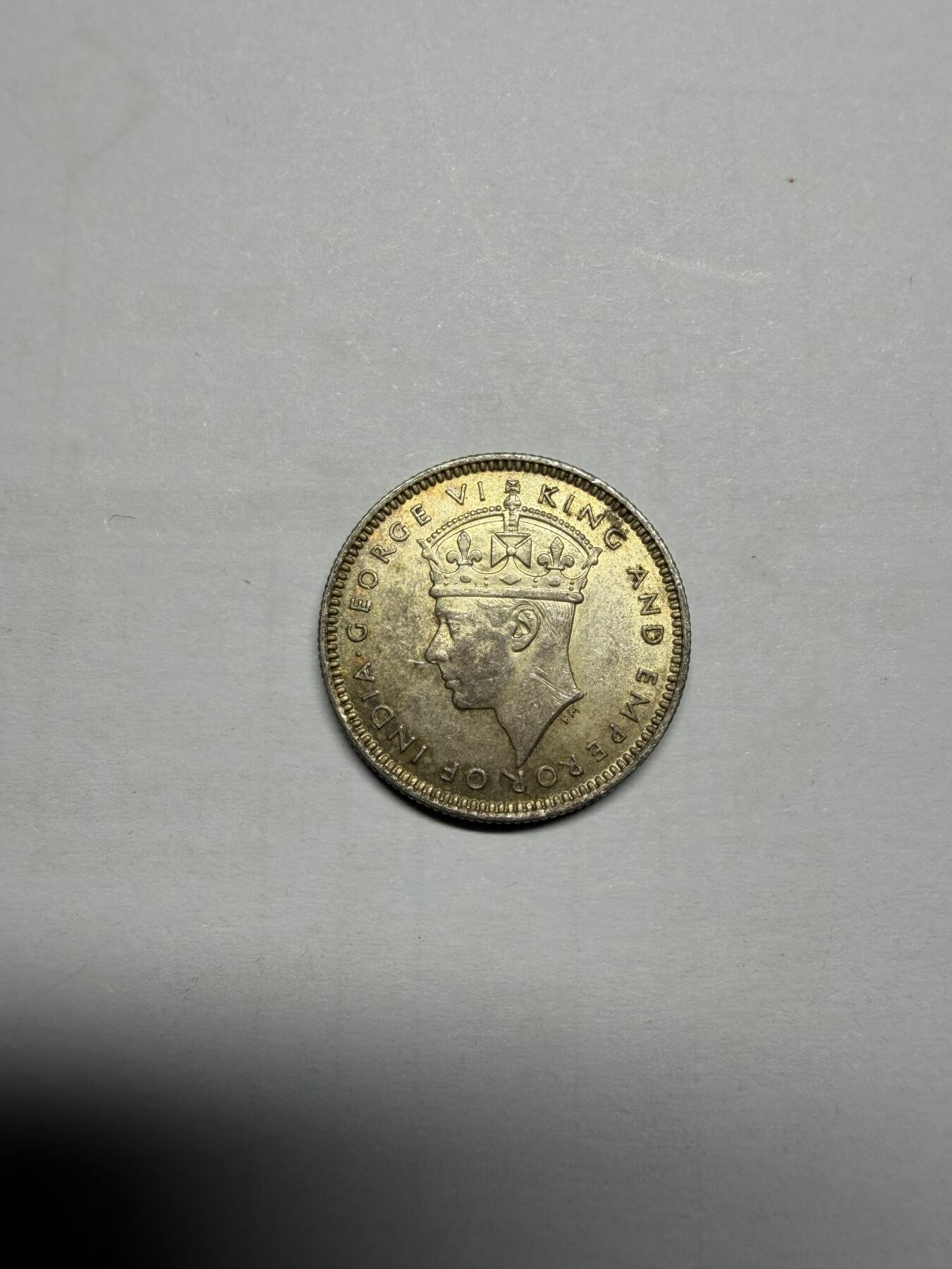 2025年集古藏今外币拍卖第十期-第4场—（总第284拍），可以寄存60天，满160元包邮。 1939年奶油黄光英属马来亚10分银币