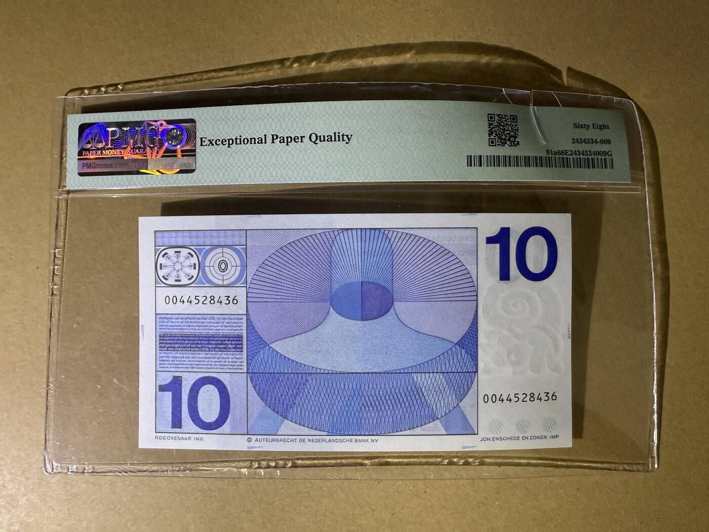 《艾美收藏》第219期-11.9周日外币畅拍场 荷兰10盾 PMG68E 初版牛眼版 壳子标签处破损 轻微弯曲 纸币密封无损 可以申请换壳或视为裸币绝品