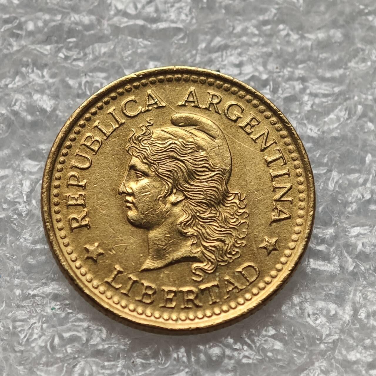 【淘币小摊】限时拍第七百九十五拍  葡属印度爪哇波兰阿根廷专场  满百包邮可预留两周  周一统一发货  阿根廷1974年10分铜币货币贬值百倍 km66