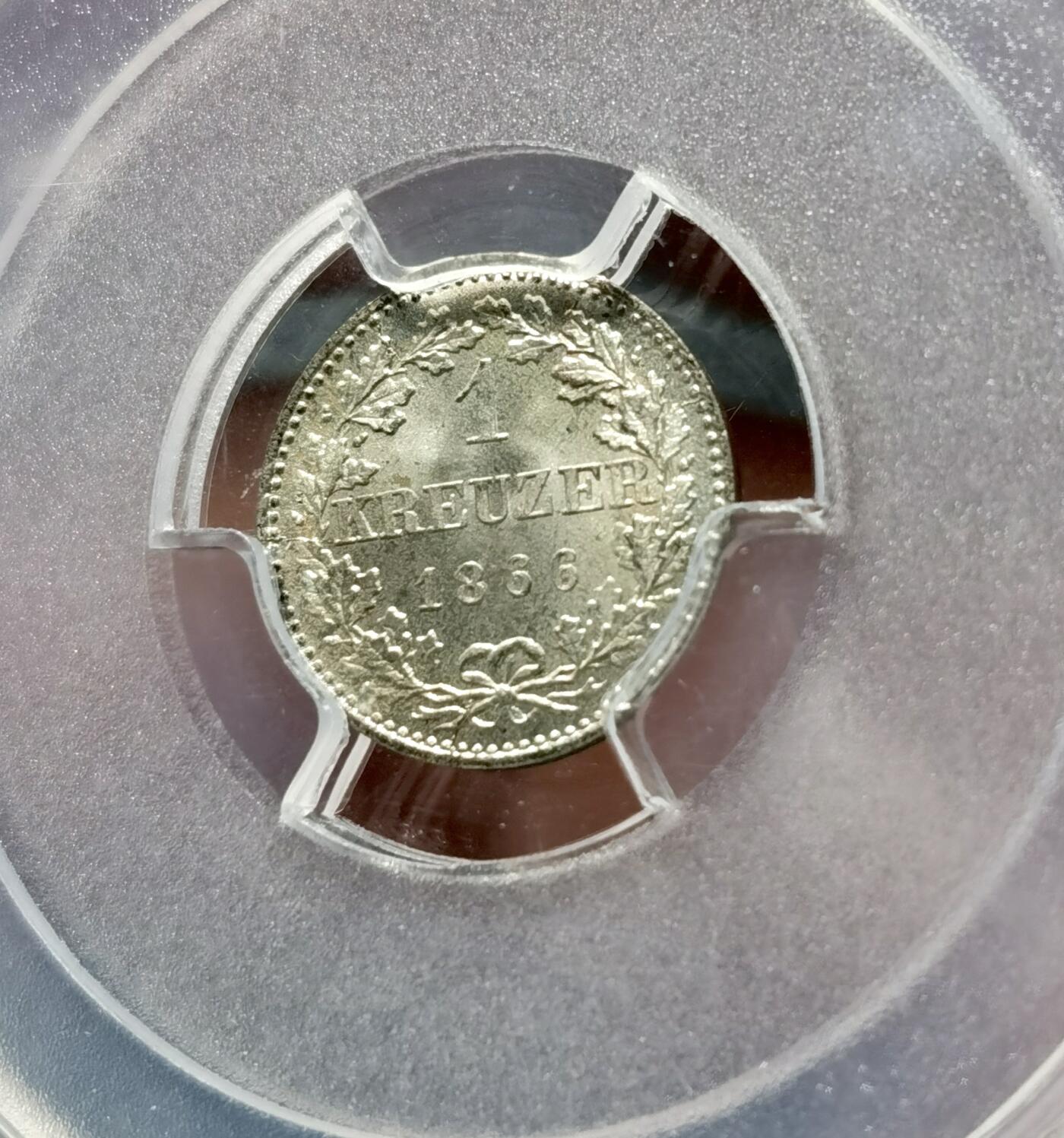 甄臻铺-世界币章拍卖（第38期）立冬小精品场，送拍享返佣金等优惠多多 NGC MS67 1866年德国法兰克福1克鲁泽银币。非常难得的高分，法兰克福经典双鹰徽章，底板如丝绸般细腻有光泽。无瑕疵的一枚精品。