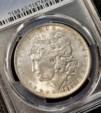 甄臻铺-世界币章拍卖（第38期）立冬小精品场，送拍享返佣金等优惠多多 PCGS-MS63 1889年美国摩根，单面炫彩，卷尾，低评