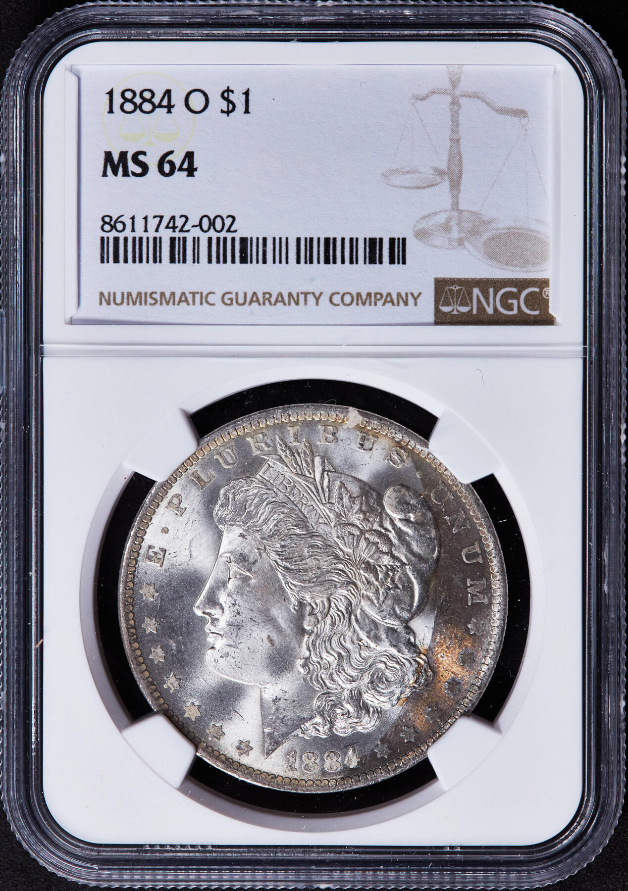 【俄甄集藏】2025年(044)11-12星期三晚 19:30 全场包邮 美国1884年O版摩根1美元大银币，NGC MS64，月牙酱彩环彩，转光品相，少见包浆状态
