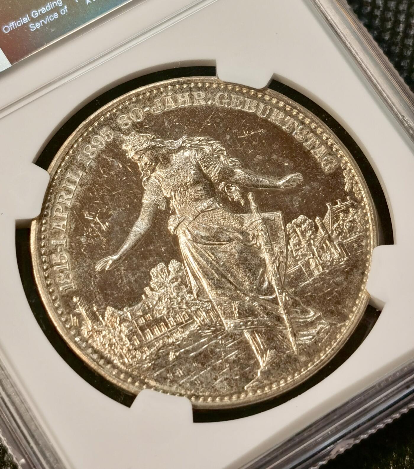 甄臻铺-世界币章拍卖（第38期）立冬小精品场，送拍享返佣金等优惠多多 NGC-MS61 德国1895年俾斯麦80寿辰纪念大银章 颇具分量38.6mm，27.52克，极少见火烧云包浆，类镜面PL工艺，高浮雕日耳曼妮娅女神端庄华贵，细节犀利，题材与品相兼具，值得收藏