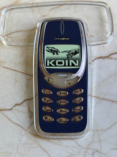 第180期拍卖【长期征集拍品】【北京币展专场】 - 纽埃2025年21世纪坚不可摧的手机2盎司异形彩色银币，币上有掉色，有氧化，999银，发行499枚