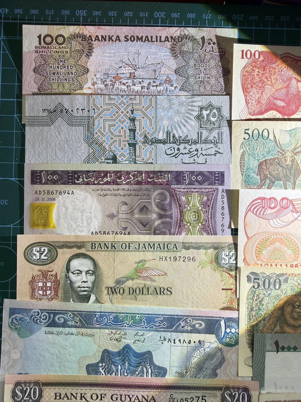 【炜奕收藏】，第五十期 杂钞共16张，大部分全新UNC品相，少部分AU、流通品相