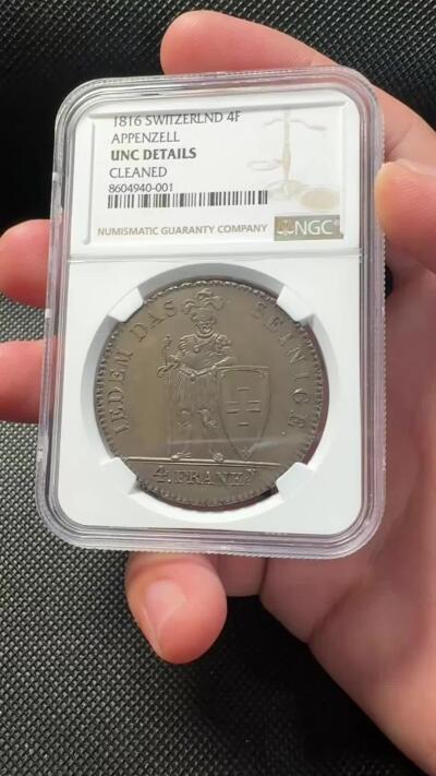 甄臻铺-世界币章拍卖（第38期）立冬小精品场，送拍享返佣金等优惠多多 NGC-UNCD 瑞士1816年阿彭策尔州雇佣兵银币 面值4法郎 发行量仅1850枚 属于瑞士雇佣兵银币系列中的稀缺品种梯队 镜面五彩底板 状态很好 