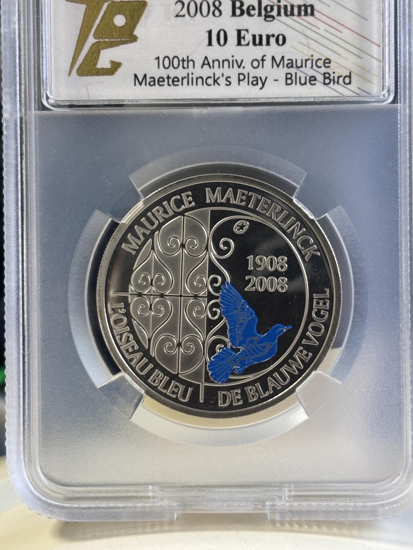 第181期拍卖 比利时2008年欧洲之星系列-莫里斯·梅特林克戏剧《蓝色小镇》上演100周年（蓝鸟）10欧局部彩色精制银币TQG PF66UC  925银 18.75克 发行量：约2万枚 