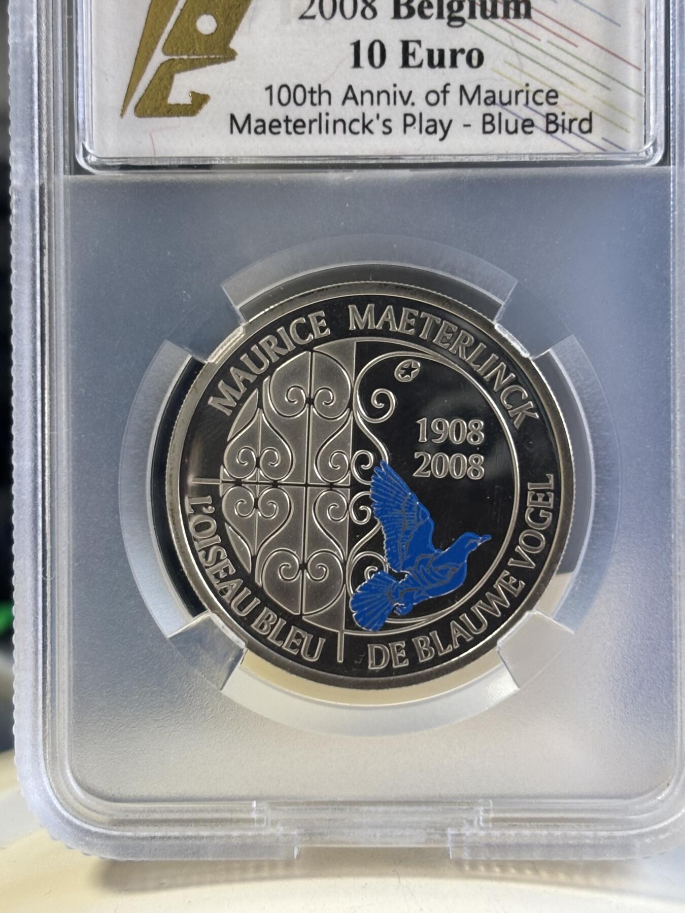 第181期拍卖 比利时2008年欧洲之星系列-莫里斯·梅特林克戏剧《蓝色小镇》上演100周年（蓝鸟）10欧局部彩色精制银币TQG PF66UC  925银 18.75克 发行量：约2万枚 