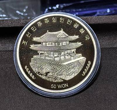 北京马甸外国币专卖第145期，外国币专场，陆续上拍，欢迎关注 2013年朝鲜50元动物孔雀精制大铜币，45mm