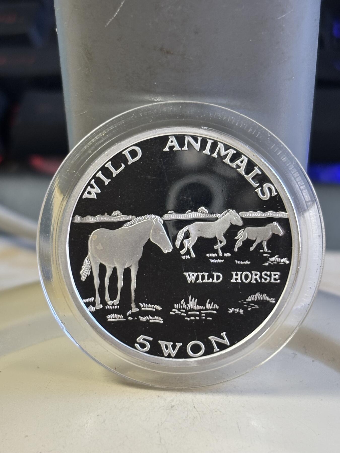 第181期拍卖 朝鲜2003年珍稀动物野马999银20克纪念银币，有氧化