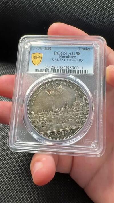 甄臻铺-世界币章拍卖（第38期）立冬小精品场，送拍享返佣金等优惠多多 PCGS-AU58 1779年德国纽伦堡城市景观泰勒大银币 五彩包浆 63分中万的品种 性价比分数 细节几乎没有磨损 更高分仅有8枚