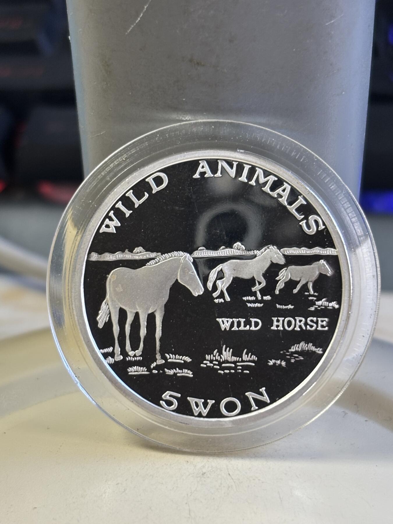 第181期拍卖 朝鲜2003年珍稀动物野马999银20克纪念银币，有氧化