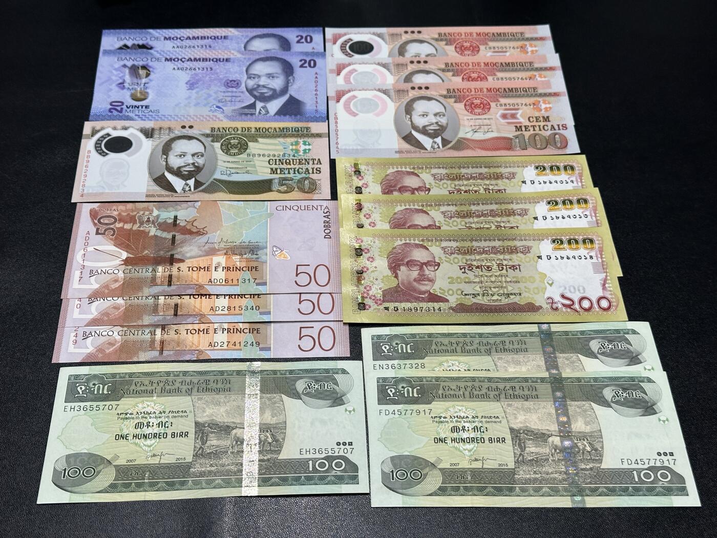 《外钞收藏家》第五百八十三期（精选场）（本期拍品丰富）（本平台长期征集拍品、欢迎藏友们联系合作） 莫桑比克20、50、100六张一起全新+圣多美和普林西比3张全新有潮+孟加拉200三张全新+埃塞俄比亚3张UNC-