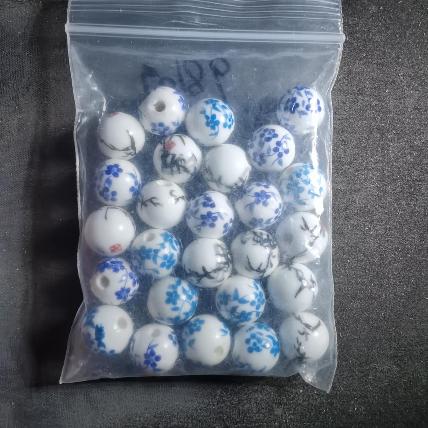 沼泽如烟--第898场 瓷珠子一袋