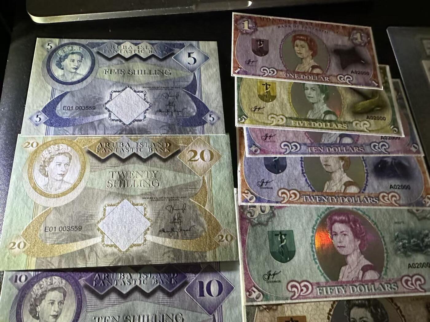 《外钞收藏家》第五百八十三期（精选场）（本期拍品丰富）（本平台长期征集拍品、欢迎藏友们联系合作） 蒙特塞拉特岛 1 5 10 20 50 100 6张同号塑料钞商业钞+阿鲁巴商业钞5张+pmg仿品2个一起