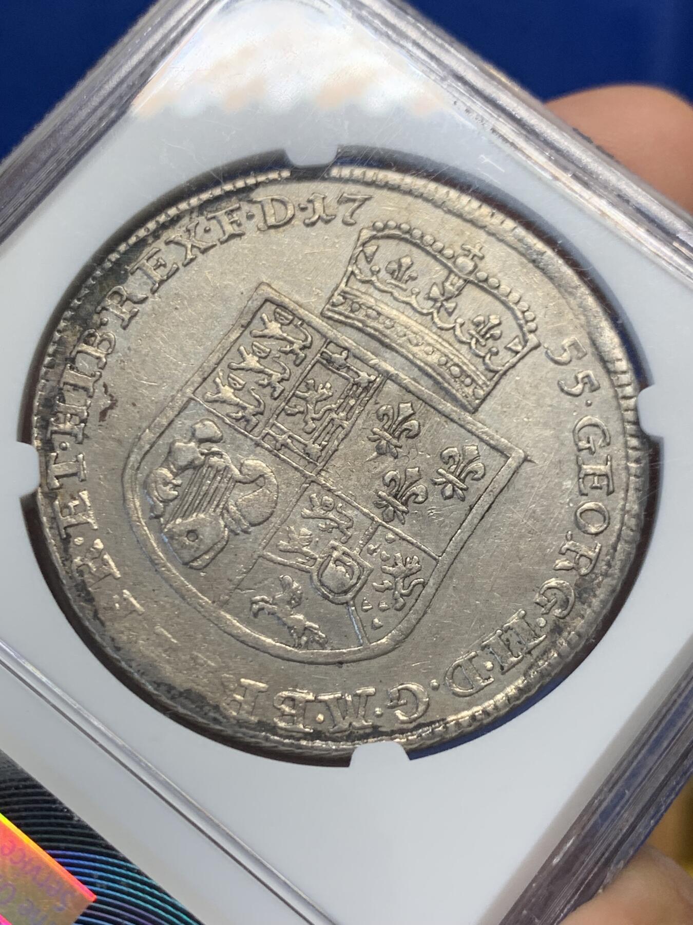 《竞宝斋》第436场 周日，周一2场连拍 （全场包邮） NGC AU55 德国1755年布伦瑞克 吕内堡 乔治三世泰勒大银币 1714年汉诺威选帝侯乔治一世依据《嗣位法》继承英国王位，而汉诺威王室源之于德国13世纪的吕内堡公爵，因此背后的徽章带有英伦的风格，这在德国泰勒当中不多见的。