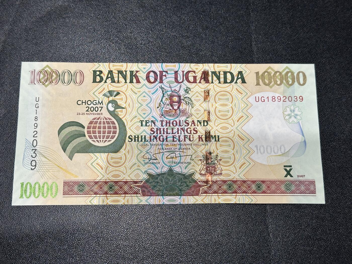 《外钞收藏家》第五百八十三期（精选场）（本期拍品丰富）（本平台长期征集拍品、欢迎藏友们联系合作） 2007年乌干达1万先令 全新UNC 无47靓号