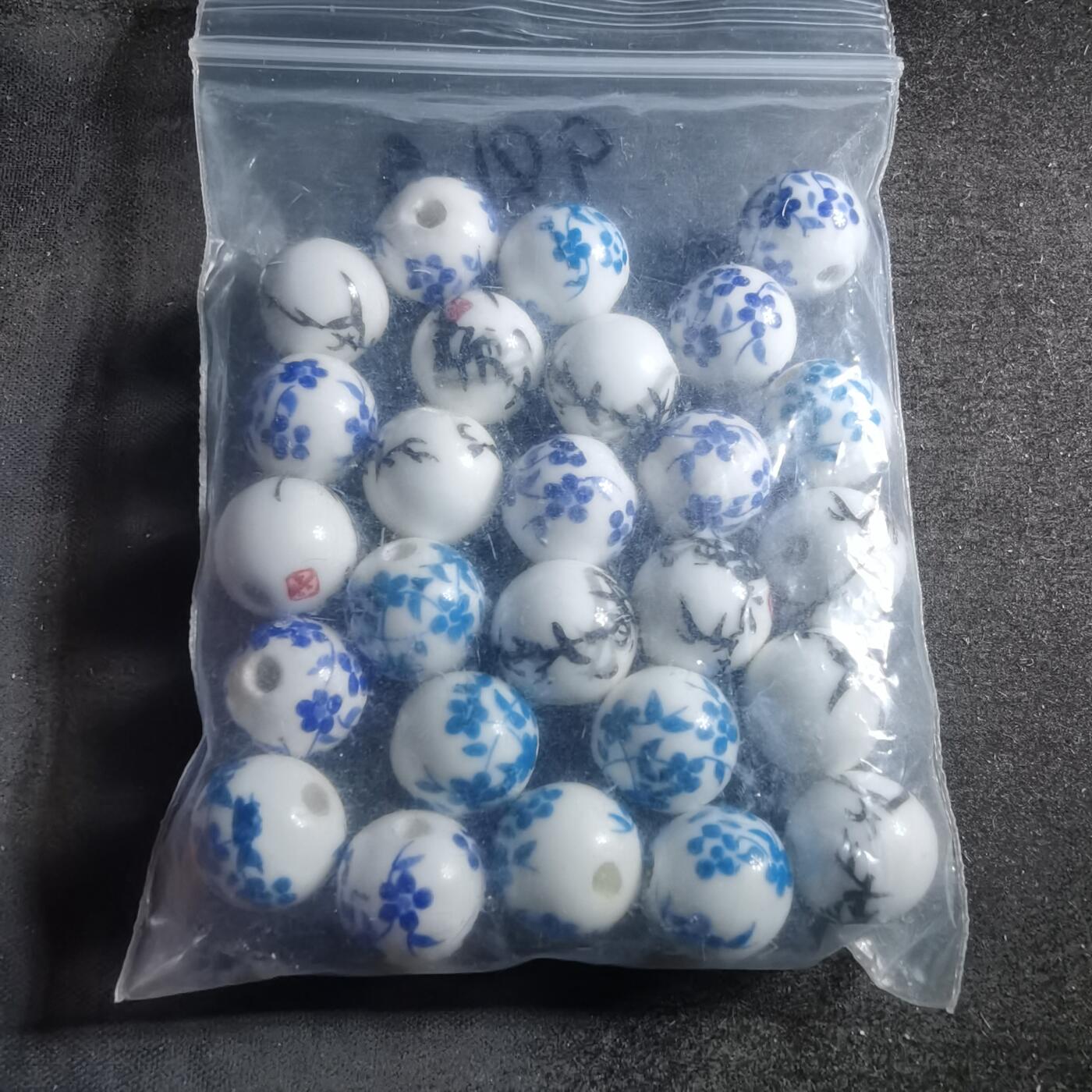 沼泽如烟--第898场 瓷珠子一袋