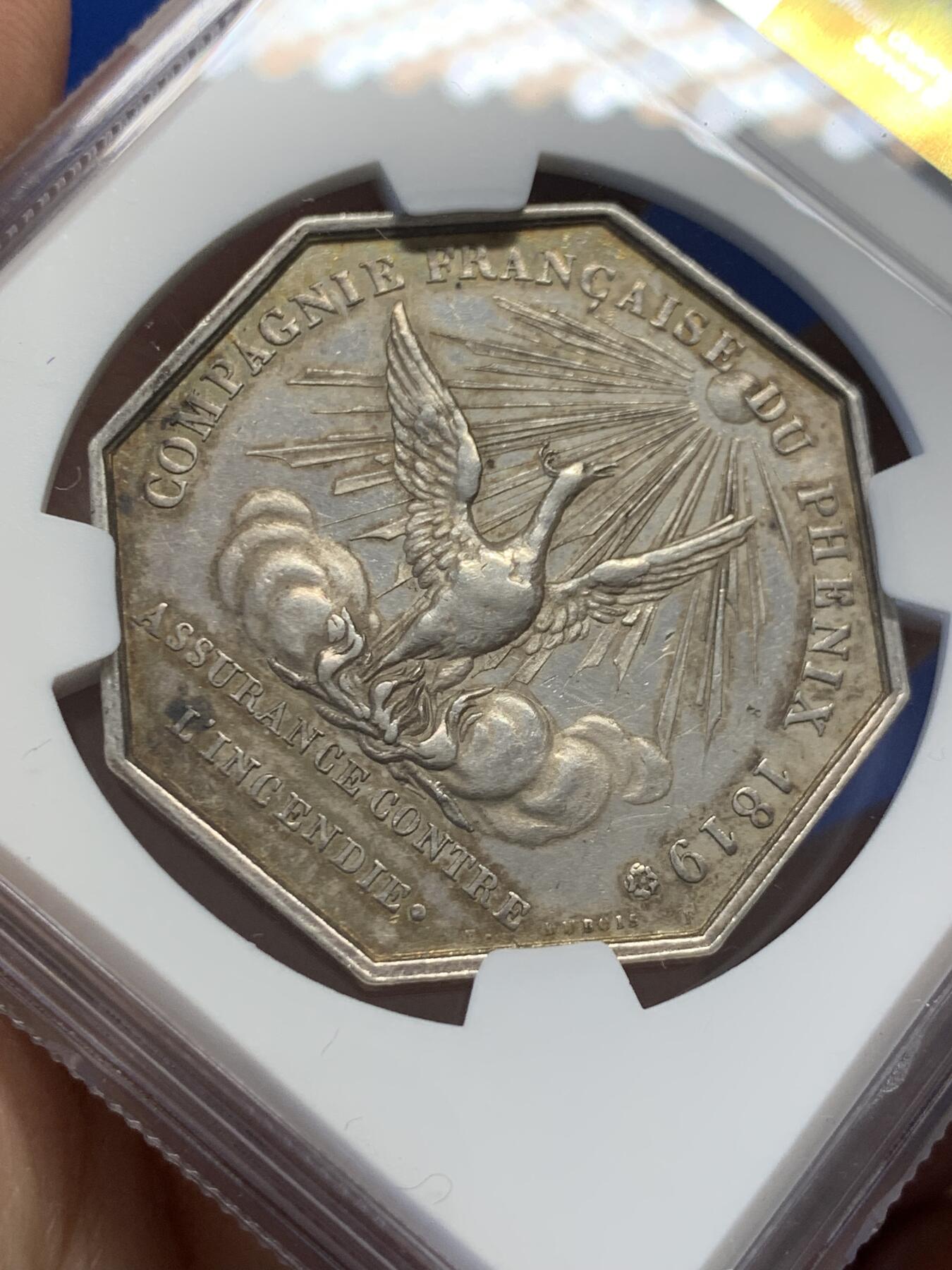 《竞宝斋》第436场 周日，周一2场连拍 （全场包邮） NGC MS61 法国1819路易十八凤凰火灾保险公司八角银质代币，少见版本，出分不易，且玩且珍惜。