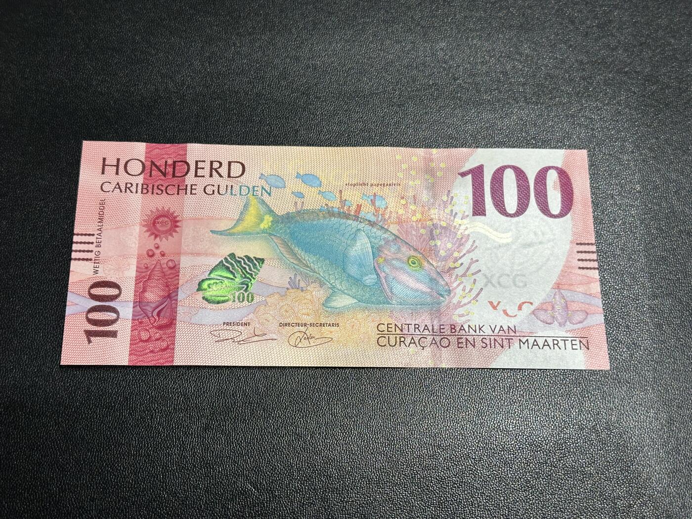 《外钞收藏家》第五百八十三期（精选场）（本期拍品丰富）（本平台长期征集拍品、欢迎藏友们联系合作） 2025年版库拉索和圣马丁100盾 全新UNC 尾703