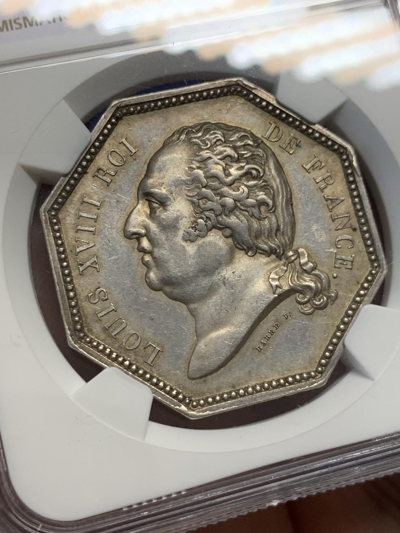 《竞宝斋》第436场 周日，周一2场连拍 （全场包邮） NGC MS61 法国1819路易十八凤凰火灾保险公司八角银质代币，少见版本，出分不易，且玩且珍惜。