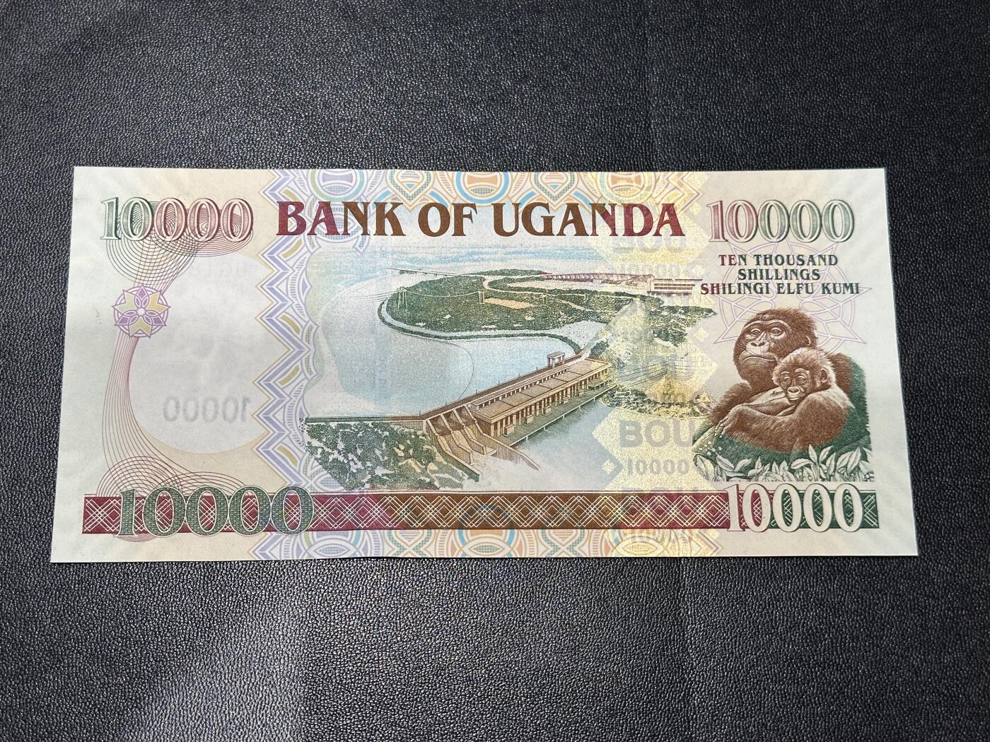 《外钞收藏家》第五百八十三期（精选场）（本期拍品丰富）（本平台长期征集拍品、欢迎藏友们联系合作） 2007年乌干达1万先令 全新UNC 无47靓号