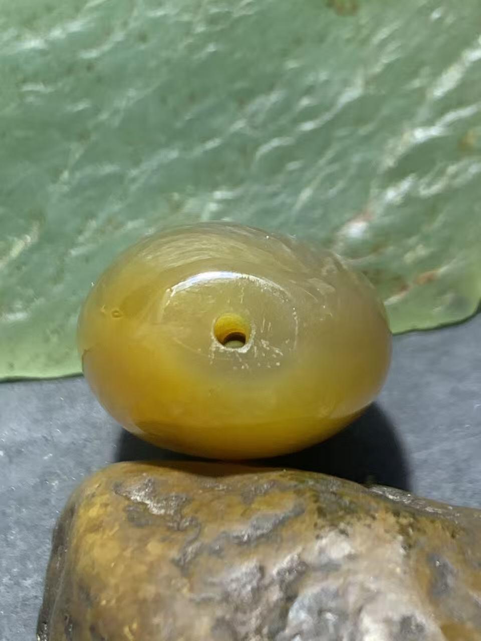 精美冻料飘鸡油黄糖心料战国红玛瑙随形勒子一颗